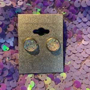 Iridescent earrings.